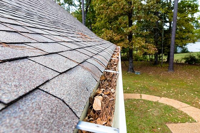 maintaining clean and clear gutters for proper drainage